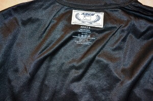 The woven label is adhered and this is now an ARCH branded tee.
